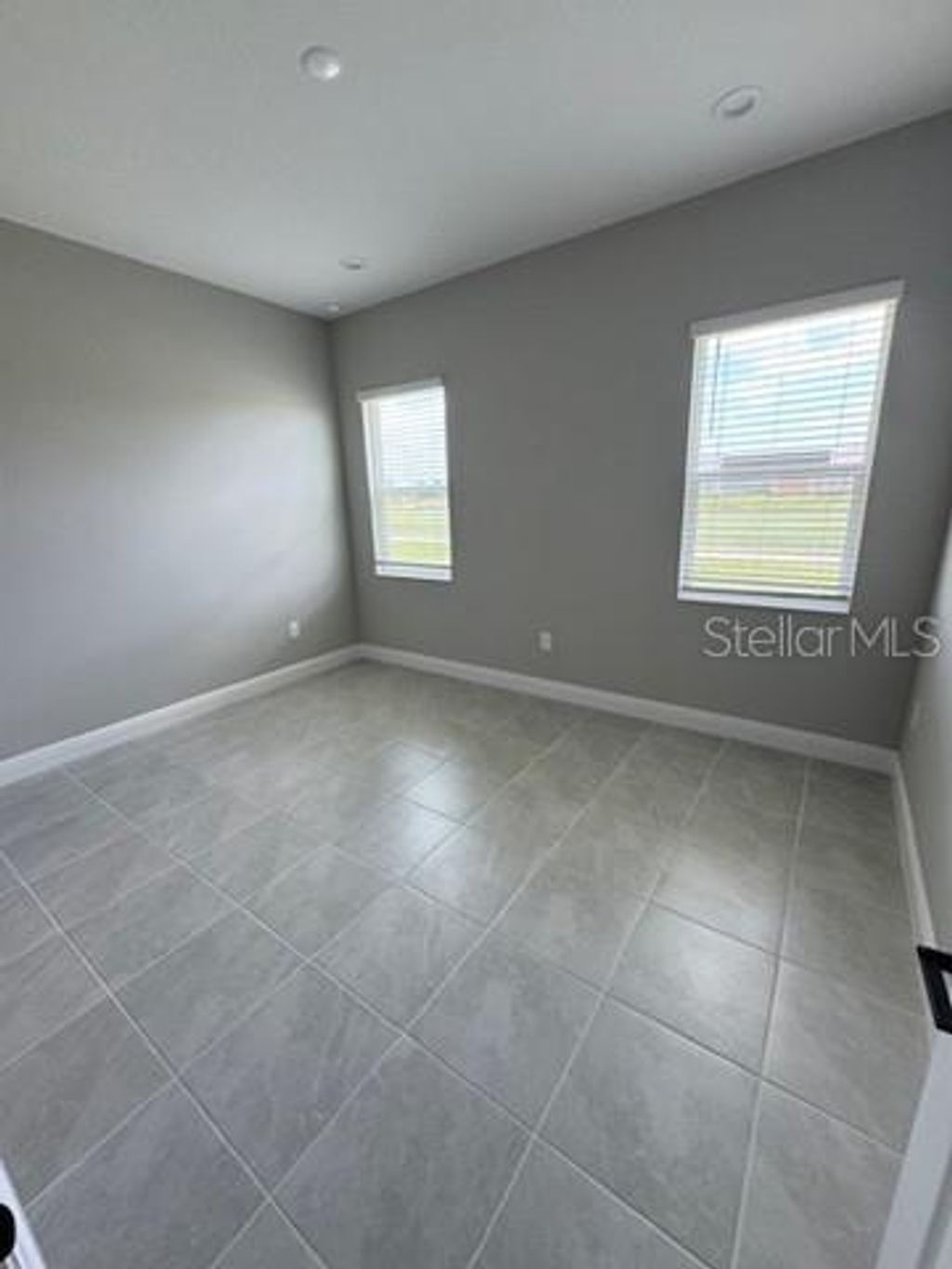 Photo of 24787 Buckingham Way, Port Charlotte, FL 33980 (MLS # A4668309)
