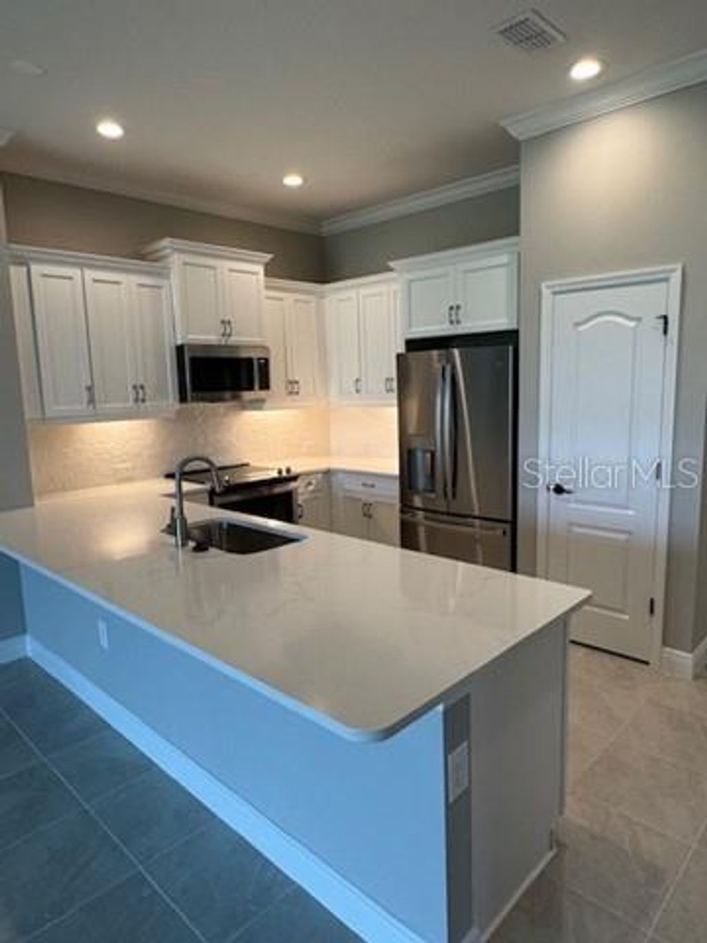 Photo of 24787 Buckingham Way, Port Charlotte, FL 33980 (MLS # A4668309)