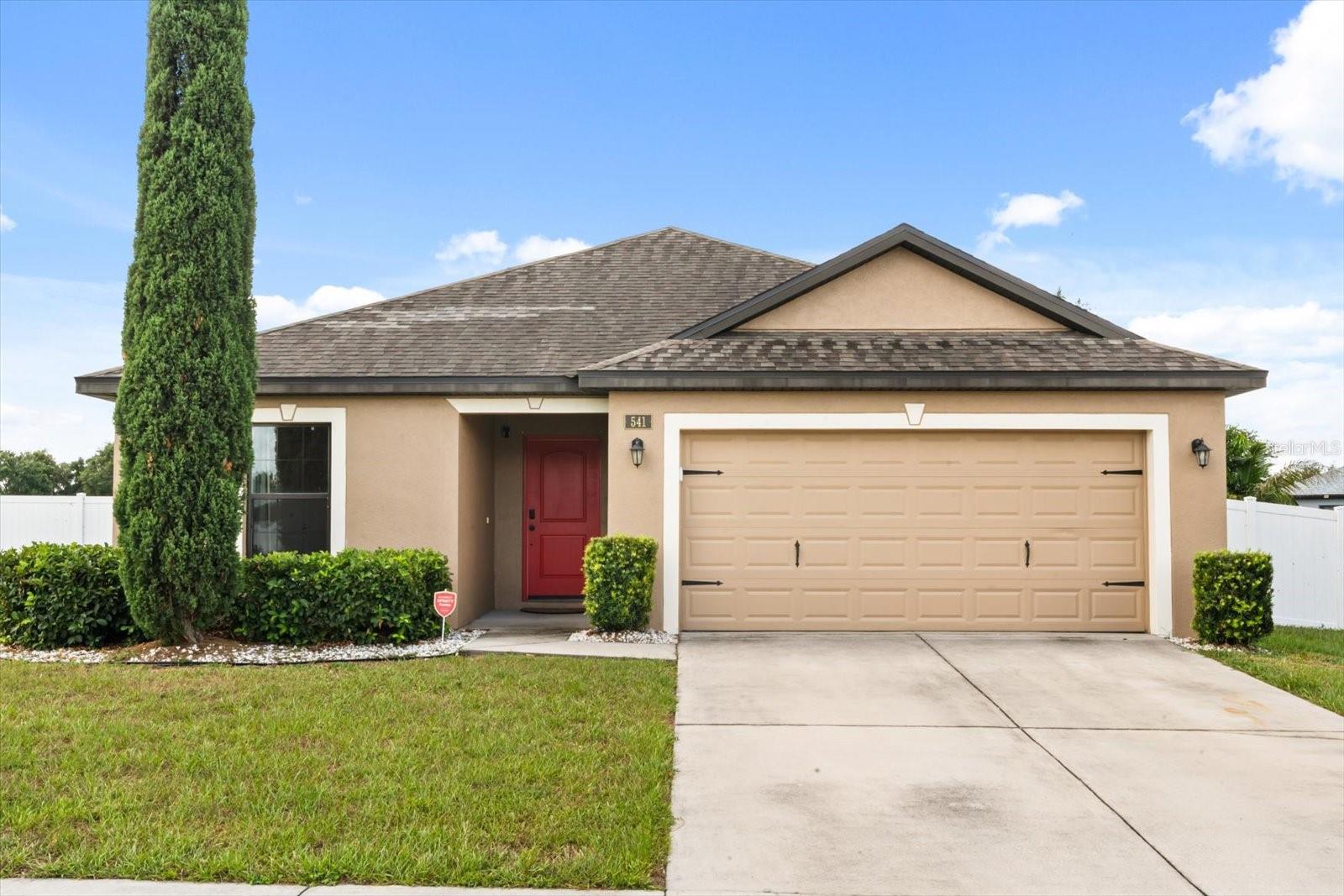 Welcome home! This property is located in the Groves at Baytree! It has a prime location and it is situated on a corner lot. When you walk in, you are greeted by a long and open foyer. To your left is the first 2 guest bedrooms with the first full bathroom in between. The bedrooms are carpeted, and are spacious! They can be used as an office or a bedroom. Continuing through the foyer, you have an open concept kitchen, living and dining space. This area also has a large sliding glass door, which over looks the backyard. The primary bedroom is on the opposite side of the living room. This space is connected to the primary en-suite and walk-in closet. You also have a full laundry room and 2 car garage. The clubhouse and amenities include: a pool, gym, soccer field, and racquetball. This community is located within minutes to downtown Tavares, Wooten Park (splash pad and park!), restaurants, walking paths, a public boat ramp and more! Come to Tavares and enjoy all that Lake Dora and The Harris Chain of Lakes has. Call today to schedule your private tour.