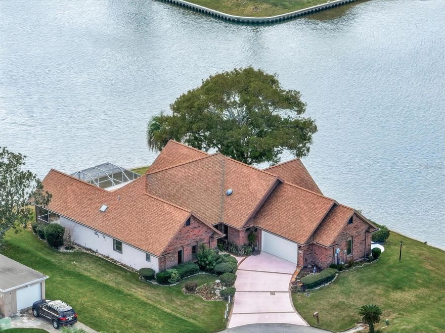 Rare Waterfront Gem on a Premier Tip Lot.  Welcome to a boater’s paradise and a rare architectural find in Palm Coast. Situated at the end of a quiet cul-de-sac, this stunning 4-bedroom, 3-bathroom residence offers the perfect blend of timeless elegance and the ultimate Florida waterfront lifestyle.

Positioned on an expansive tip lot on a deep saltwater canal, this property features panoramic water views, and  an incredible 200+ feet of bulkheaded waterfrontage. It is located just moments from the Intracoastal Waterway. 

Unlike the standard Florida stucco, this home features a beautiful brick exterior, offering a sense of permanence and classic style that stands out.

 Inside, you’ll find a thoughtful open and split floor plan. This design maximizes privacy by separating the primary suite from the guest bedrooms while keeping the heart of the home connected.

The Kitchen is  chef’s delight, the over-sized kitchen features ample counter space and storage, flowing seamlessly into the living areas—ideal for hosting dinner parties or holiday gatherings.

Step through the sliding doors into your private oasis. The large screened lanai provides a massive footprint for outdoor dining and lounging, protected from the elements.

This home represents a rare opportunity to own one of the most significant waterfront footprints in Palm Coast. Whether you are a dedicated angler or a seeker of serene views, 10 Castle Court is ready to welcome you home.