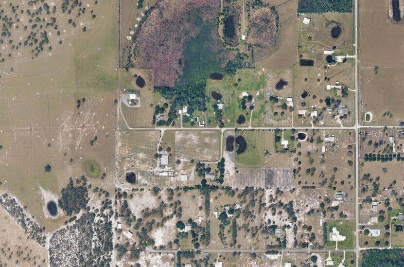 Photo of 2130 Bird Of Paradise Avenue, Sebring, FL 33875 (MLS # O6432763)