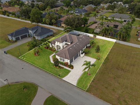 Photo of 4462 Emerald Palms Lane, Winter Haven, FL 33884 (MLS # L4957531)