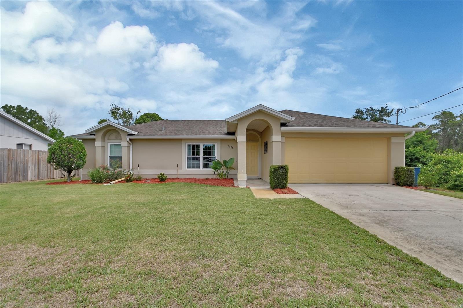 PRICE DROP!!! Charming 3 Bedroom 2-bathroom home on Spacious 1/4 Acre Lot. Welcome to this beautifully updated move in ready block home nestled on a quiet paved street. Situated on .26-acre Lot, this property features a large fenced in back yard, perfect for entertaining, BBQ's, your pets & kids and enjoying Florida living! The outdoor space also includes a storage shed perfect for lawn mower, Bikes, man cave, etc. This property also includes a well maintained Lanscaping fully operational irrigation system perfect for keeping your grass green all year long! Inside you will find modern updates throughout the home, making this stylish and comfortable. Located near I-95 and I-4, It's an ideal location for commuters traveling to Jacksonville or Orlando. DON'T MISS THIS GEM- A PERFECT BLEND OF COMFORT, CONVEINENCE, AND CHARM!