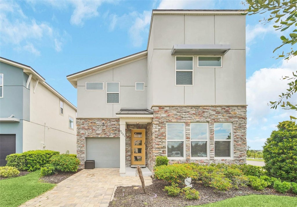 Photo of 9001 Egret Mills Terrace, Kissimmee, FL 34747 (MLS # O6443128)