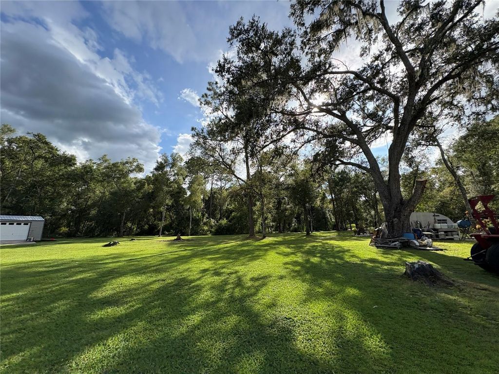 Photo of Lucilles Shady Lane, Nobleton, FL 34661 (MLS # TB8424547)