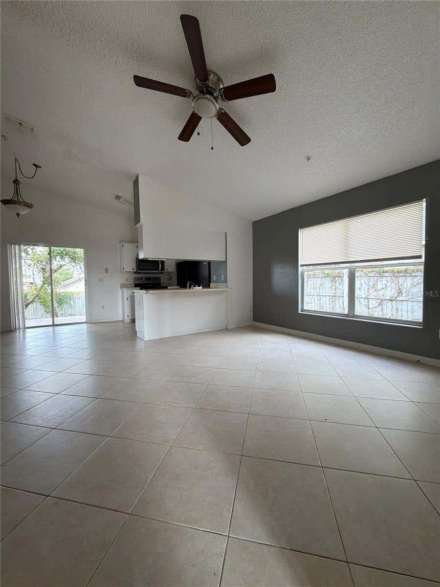 Photo of 13855 Glasser Avenue, Orlando, FL 32826 (MLS # O6431694)