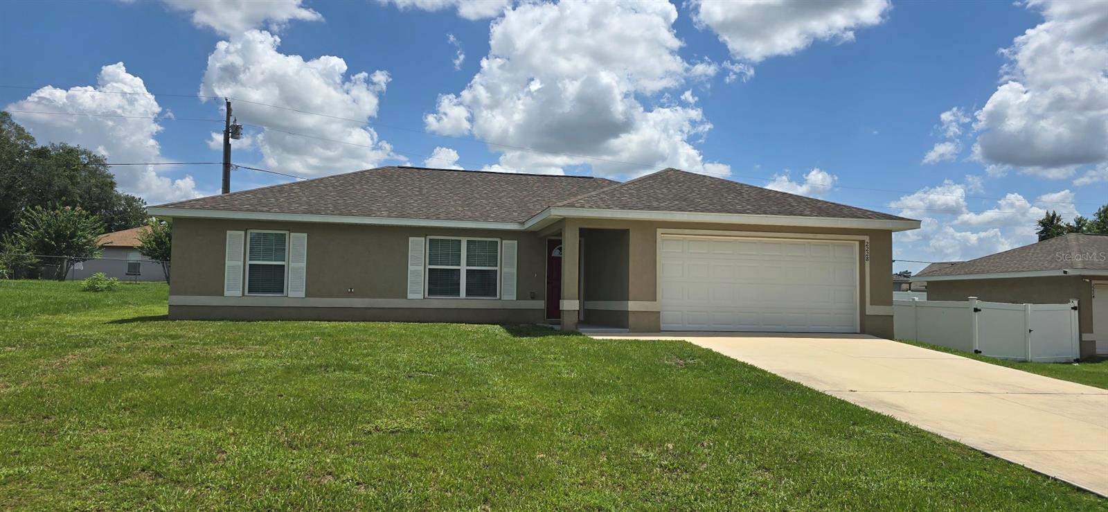 Custom 3 bed, 2 bath home with attached 2-car garage in Marion Oaks. Spacious kitchen that includes refrigerator, range with hood, and dishwasher. New laminate flooring in living room. Garage has epoxy flooring. Large back yard. High efficiency windows. Close to Dollar Tree distribution center and I-75 interchange.