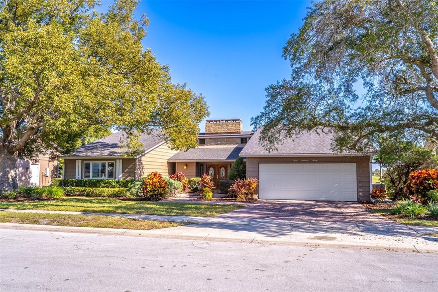 Be prepared to be impressed with fabulous golf course home! It has strong systems, unbeatable views and a fantastic location. The home boasts a brand-new roof, HVAC and water heater! The golf course views are peaceful and serene. Upon entering the home, you are greeted by generous entry way which leads into the grand living room with a stone fireplace, French doors to the screened-in patio, wonderful golf course views and ample space to entertain family and friends. The dining room is off of the family room and has French doors that lead to the Florida room. The kitchen offers stainless steel appliances, crisp white soft-close cabinets & drawers and a nice sized eat-in area. Directly off the kitchen is the Florida room with loads of natural light and a French door which leads to the backyard. The primary bedroom includes a walk-in closet, ensuite bathroom and French doors which lead to the open rear patio, providing the perfect spot to watch golfers in action. The secondary bedrooms share a hallway bathroom. This home provides loads of storage space. The screened-in back porch and open rear patio showcase outstanding golf course views and are excellent spots to enjoy the Florida lifestyle. Other amenities and updates include gorgeous wood flooring in main living spaces and primary bedroom, plantation shutters, and interior laundry off kitchen with loads of cabinet space for pantry items and much more. Additional fun facts about this home: it's located just a tenth of a mile from Wekiva Elementary School and is home to the very first Little Library in the state of Florida. Welcome Home!