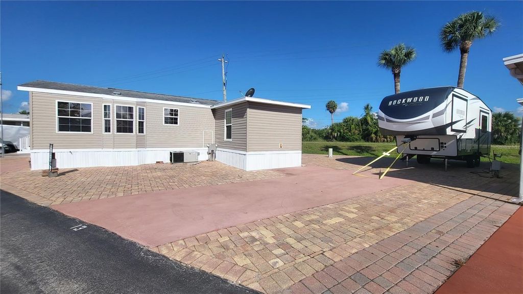 Photo of 7950 State Road 78 W #12+13, Okeechobee, FL 34974 (MLS # OK224951)
