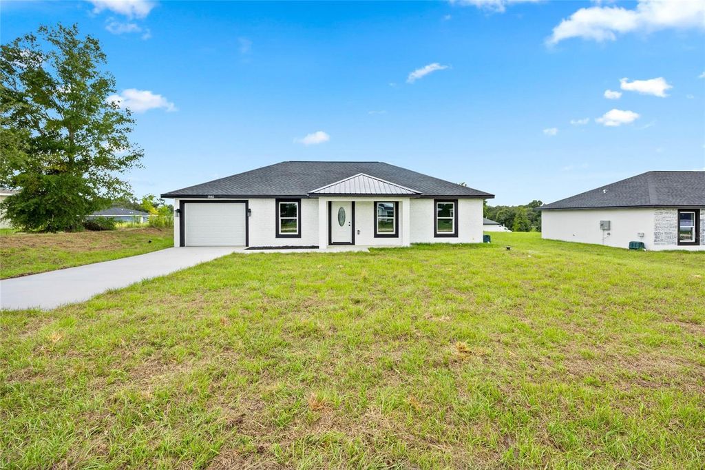 Photo of 13081 SW 107th Street, Dunnellon, FL 34432 (MLS # OM707266)