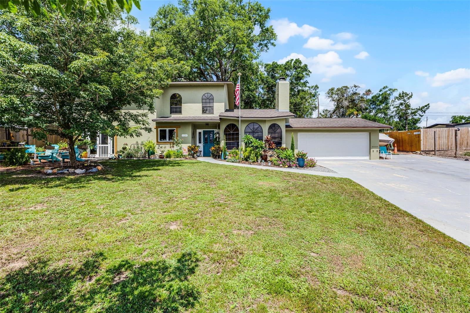 LAKEVIEW home located in downtown CLERMONT! As you walk up you will notice the GREAT VIEWS of both Shady Nook Lake and the CITRUS TOWER not to mention great firework displays on the holidays. The KITCHEN is oversized and OPEN to the family room....great for entertaining! The kitchen cabinets are solid wood and have granite counter tops. Plenty of storage and a large island- for the CHEF in YOU! Downstairs you will also find a formal living room (with a wood burning fireplace) currently being used as a bedroom and very large half bath, laundry room PLUS an oversized mudroom (bonus room) as you enter from the garage measuring 13x10 that can double as a craft room or office. As you travel upstairs be sure to notice the wood stairway that leads to the three bedrooms, all good size and the primary bedroom actually being oversized. The primary bath offers dual sinks and a nice size walk in shower. Located upstairs is also another full bath and all three bedrooms have brand new carpet recently installed. The garage is a two car garage and has a garage door opener. Plenty of on site parking as there is enough room to park approximately 8-10 vehicles. As you walk around to the back yard you will notice the backyard is mostly fenced with wooden and wire fencing. After a long day relax by the fire pit or enjoy the amazing views from the front yard. NO HOA and plenty of room to park your BOAT and/or RV. COME SEE this beautifully maintained CLERMONT HOME!