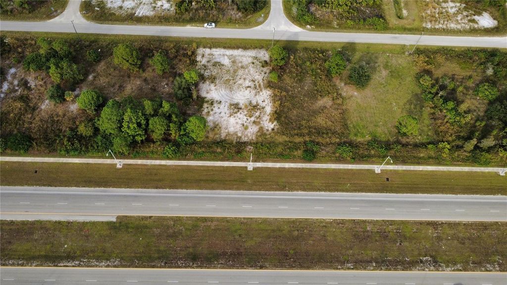 Photo of 2906 Meadow Road, Lehigh Acres, FL 33974 (MLS # C7514345)