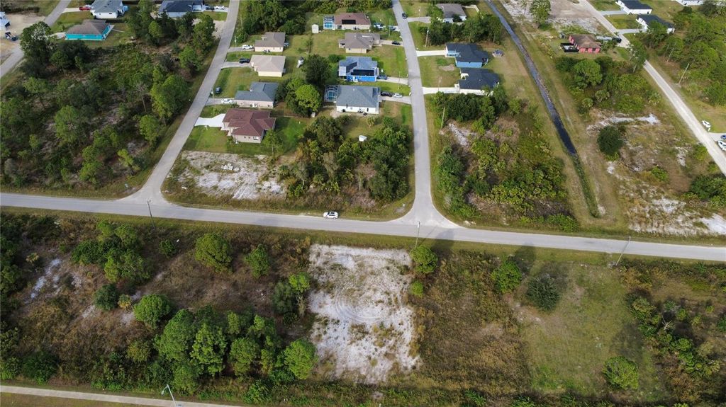 Photo of 2906 Meadow Road, Lehigh Acres, FL 33974 (MLS # C7514345)