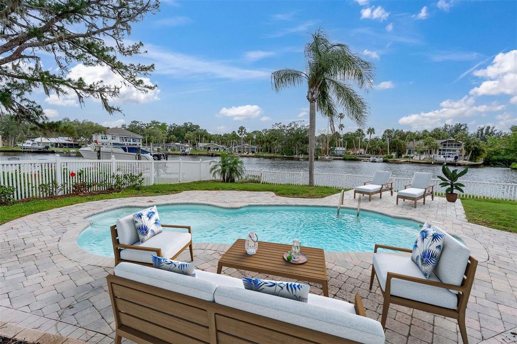 Photo of 5440 Manatee Point Dr, New Port Richey, FL 34652 (MLS # W7876208)