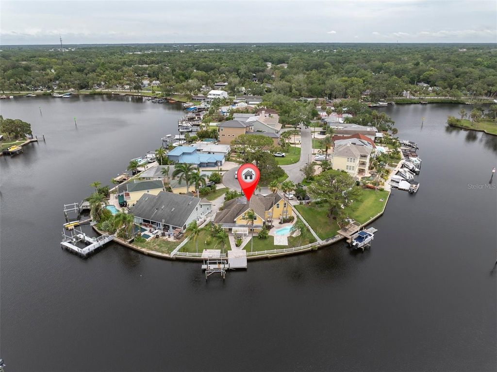 Photo of 5440 Manatee Point Dr, New Port Richey, FL 34652 (MLS # W7876208)