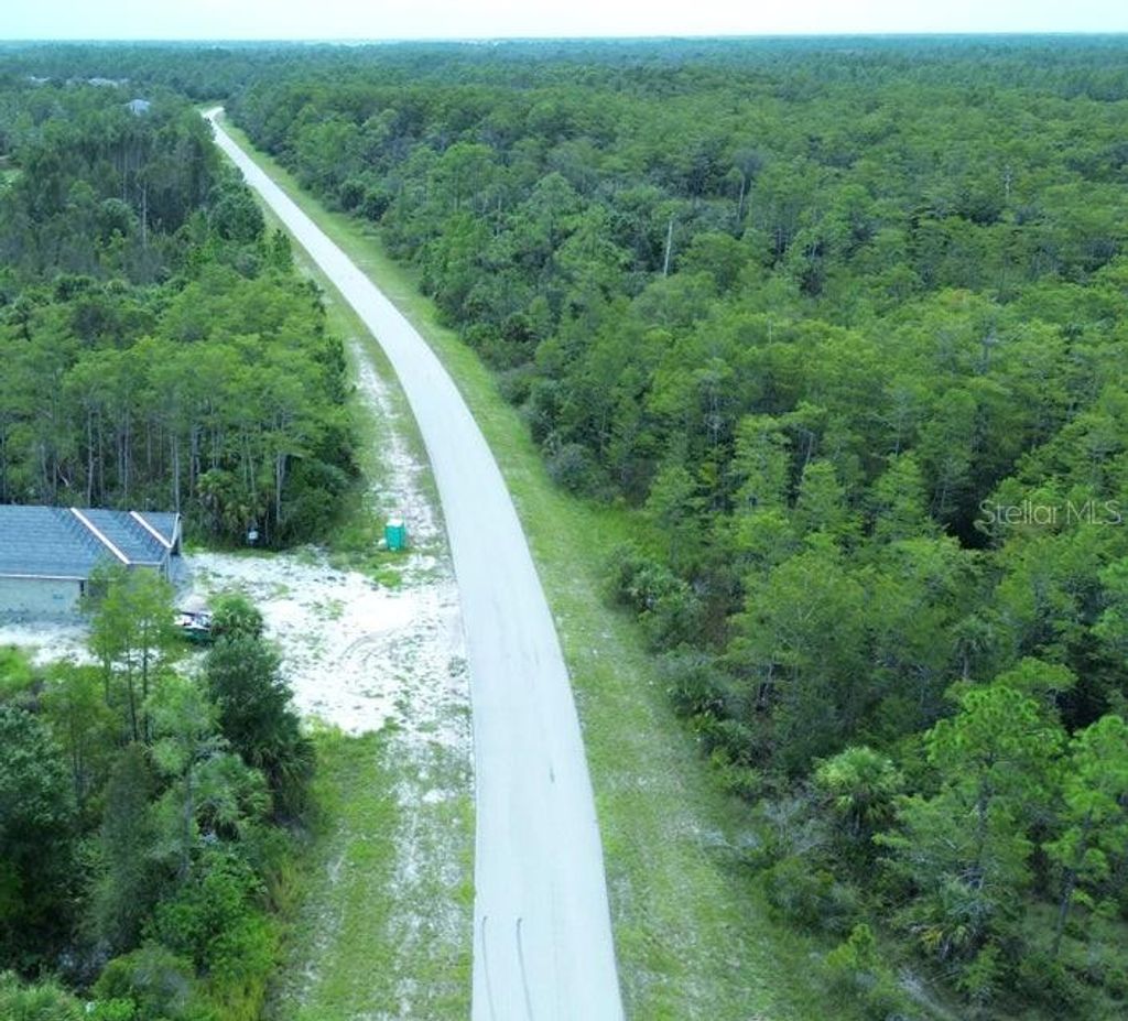 Photo of 483 Greenbriar Boulevard, Lehigh Acres, FL 33972 (MLS # TB8460874)