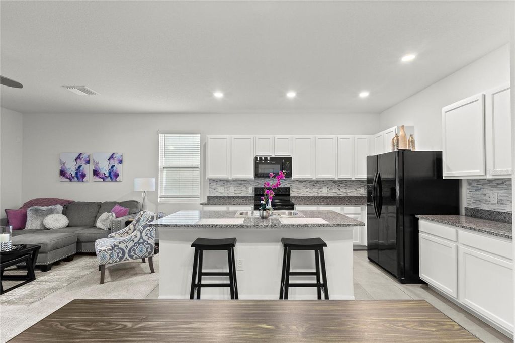 Photo of 32946 Kaloko Road, Wesley Chapel, FL 33543 (MLS # TB8462784)