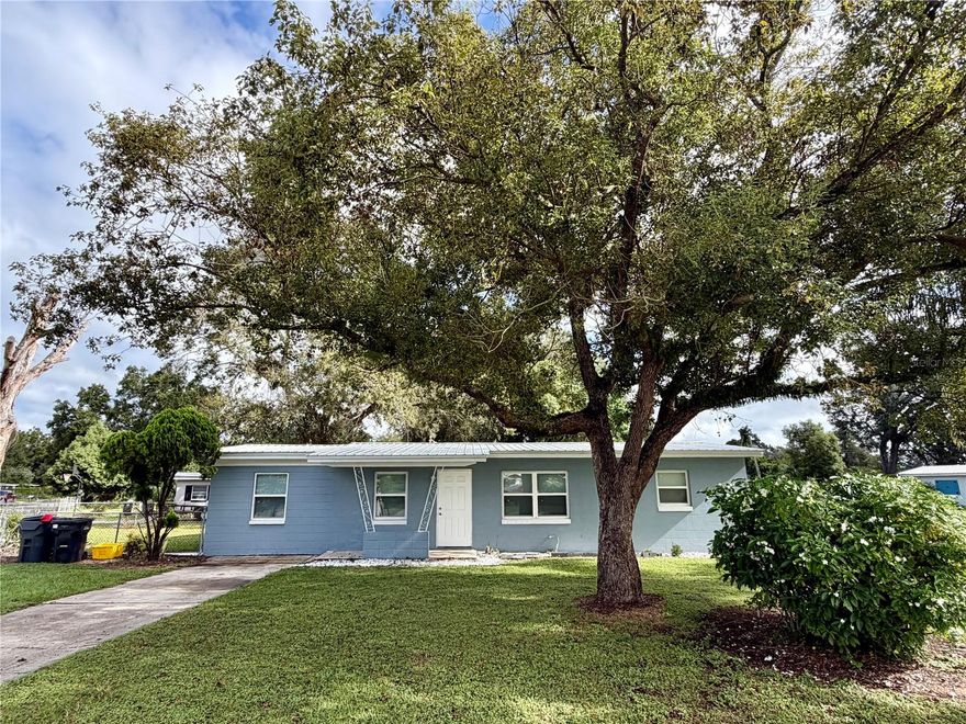 You must see this adorable 3 bedroom 1 bathroom home located in  south Lakeland near 540A and US 98. This completely remodeled home boasts  a new metal roof (2023), new flooring (2024), new windows (2024), new paint inside and out, new appliances (2024), new HVAC (2024), and a new septic tank and drain flied. The completely renovated bathroom has a new walk in shower, new toilet, and a new vanity. There is a bonus room that could easily be used as a fourth bedroom if needed. The home is located on a large corner lot with a fenced in backyard. The property is conveniently located to many shopping centers, parks, grocery stores, and the Polk Parkway for easy commutes to Orlando and Tampa. You must see this home in person to truly appreciate. Set up your showing today before it is gone!