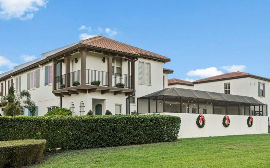 Prepare to see the most decked out and finely finished townhome in Central Florida! This Toll Brothers end unit has been completely customized with over $140,000 in structural upgrades and $270,000 in design upgrades--that's right, more than $400k in upgrades, and the original sale was more than DOUBLE the price of many of the other townhomes in the community.  Facing the lush landscape of the courtyard and adjacent to wide open space, this Cicero model includes a 778 square foot fully private courtyard, screen enclosed and with a full summer kitchen, gas fire pit, and pet friendly astroturf, all within a privacy wall.  Upon entry you are greeted by an open concept great room with 10-foot ceilings that lead to the well-appointed Chef's kitchen with center island, with select exotic granite slab countertops and 42” upper cabinets. The private main-floor master suite features a soaking tub, a separate shower and a large walk-in closet.  The back hallway, complete with tech center and upper cabinets can serve as a downstairs office.  Downstairs also includes a convenient powder bath. French doors off of the kitchen open to the large courtyard. Upstairs features two additional bedrooms, a full bath and loft with breakfast bar and private balcony that overlooks the courtyard.  Serving up gourmet finishes with upgraded everything, including plantation shutters, security system, upgraded lighting, electrical features, dimmers, audio system, and beverage refrigerators abound... The home also has a full one-bedroom guest apartment with its own kitchenette and living area over the garage that is connected to the patio courtyard and accessed via a private entrance.  
Lakeshore is ideally located in the Horizon West corridor only minutes from Disney, Hamlin, and enjoys immediate highway access.  The amenities of Lakeshore on serene Panther Lake are second to none, with a lakeside clubhouse, kayaking and paddleboarding, a playground, world-class fitness center, resort-style pool and sensational lake and golf views–a Florida lake lifestyle like no other, for those seeking the best of the best with no sacrifice in convenience.