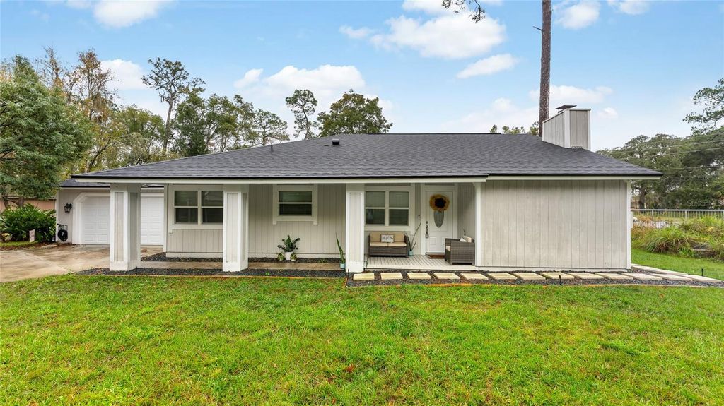 Photo of 64 Ravenwood Court, Ormond Beach, FL 32174 (MLS # V4943232)