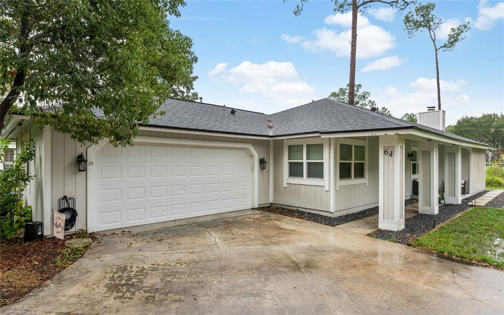 Photo of 64 Ravenwood Court, Ormond Beach, FL 32174 (MLS # V4943232)