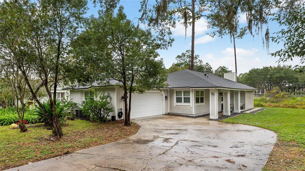 Photo of 64 Ravenwood Court, Ormond Beach, FL 32174 (MLS # V4943232)