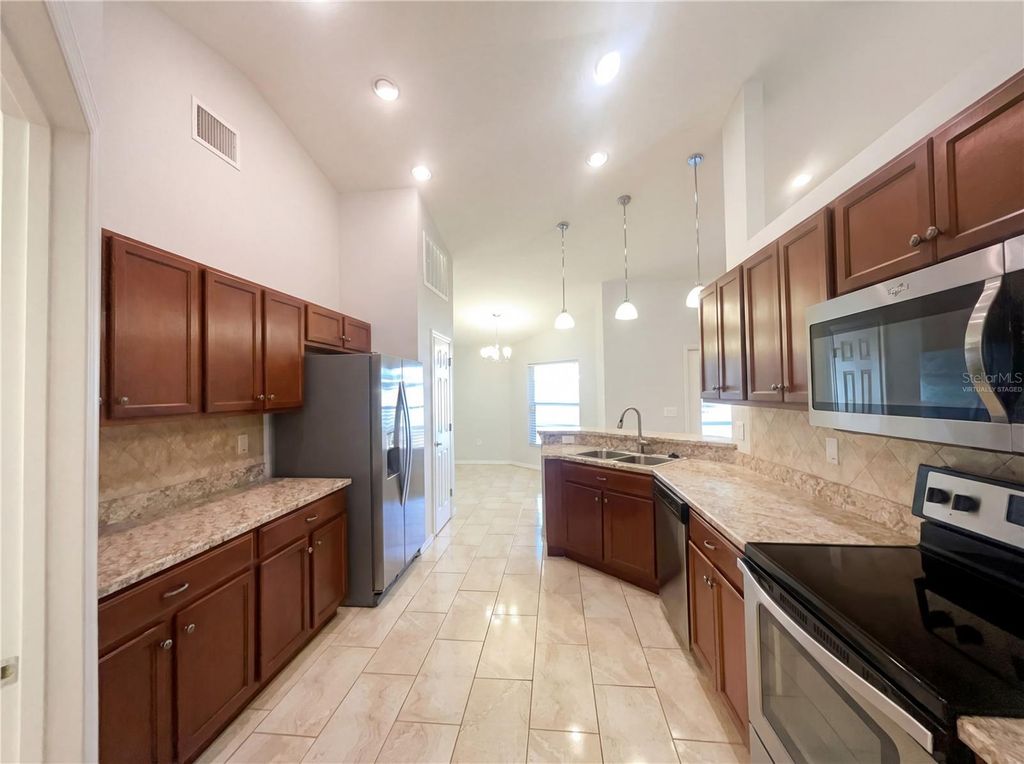 Photo of 1553 Shorewood Drive, Auburndale, FL 33823 (MLS # O6381802)