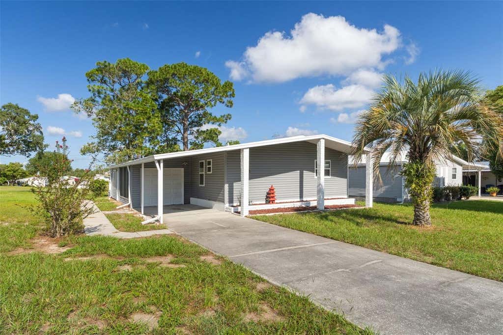 Photo of 7713 Moriah Avenue, Brooksville, FL 34613 (MLS # TB8540442)
