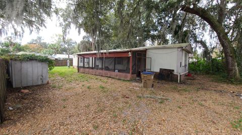 Photo of 1674 Magnolia Lane, Kissimmee, FL 34746 (MLS # S5142116)