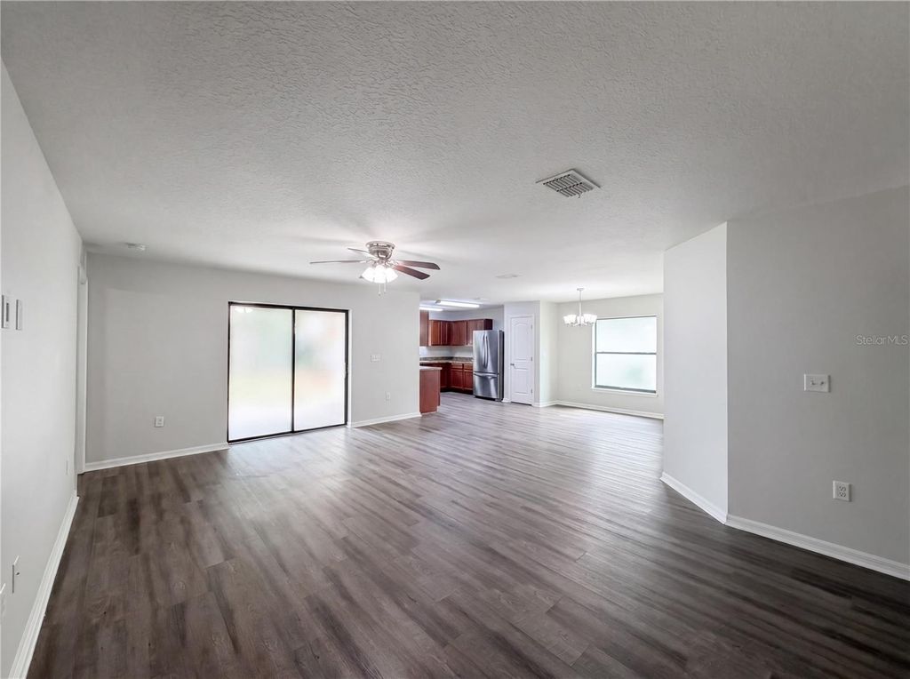 Photo of 2440 Bracknell Forest Trail, Tavares, FL 32778 (MLS # O6401822)