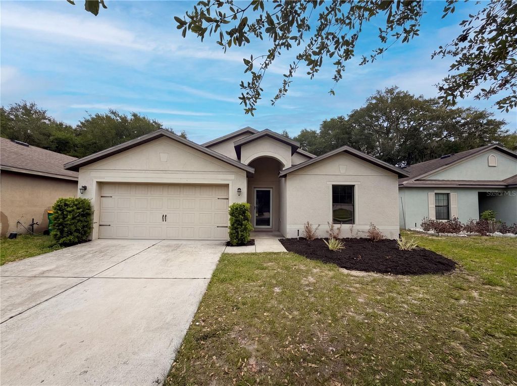 Photo of 2440 Bracknell Forest Trail, Tavares, FL 32778 (MLS # O6401822)