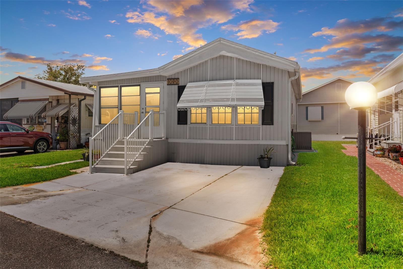 Welcome to 3333 26th Ave E, Bradenton, FL 34208—a charming manufactured home nestled in the vibrant 55+ community of Sugar Creek Country Club. This delightful and cozy residence offers a comfortable and convenient lifestyle in a serene setting. The home boasts a newer water heater, roof, new Pex plumbing in 2019 and new A/C and ductwork replaced in 2025, along with updated siding. The inviting kitchen offers ample room for entertaining, while the laundry room includes built-ins for added storage. Sugar Creek Country Club offers a resort-style living experience with amenities such as two swimming pools and a heated spa, Fitness room, workshop, and clubhouse, Tennis and shuffleboard courts. Don't miss the opportunity to own this charming home in a sought-after community. Schedule your private showing today and start enjoying the Florida lifestyle you've been dreaming of.