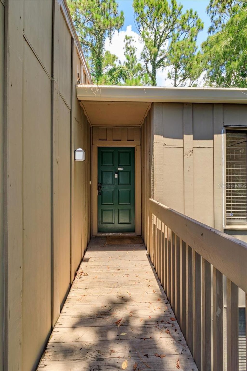 Photo of 5303 Indian Creek Drive #D, Orlando, FL 32811 (MLS # O6406171)