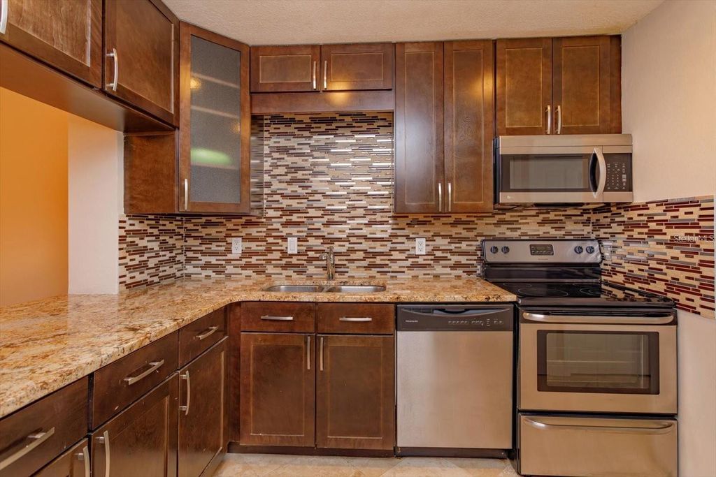 Photo of 5303 Indian Creek Drive #D, Orlando, FL 32811 (MLS # O6406171)