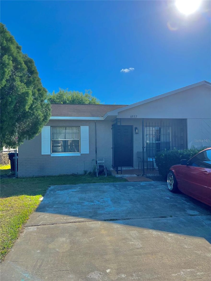 2/1 Half a Duplex with a bonus room! This cozy home was remodeled within the last year, with brand new kitchen cabinets, vinyl flooring and bathroom shower all new! A/C and Roof were replaced less than 6 yrs ago as well.  Wonderful backyard to enjoy during warm weather. With a great location, near airport and shopping center, you do not want to pass on this opportunity.