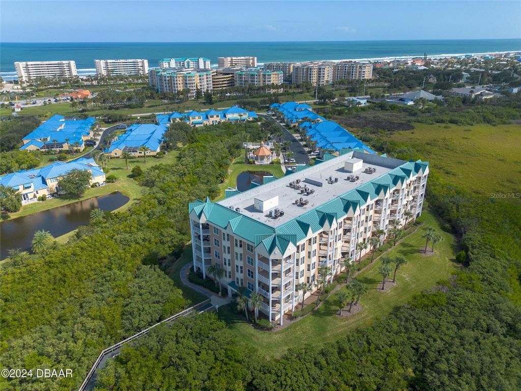 Photo of 4672 Riverwalk Village Court #8203, Ponce Inlet, FL 32127 (MLS # NS1085684)