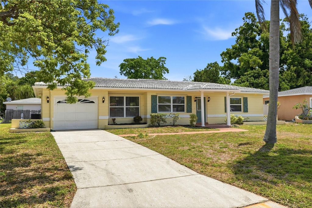 Photo of 4813 Lake Charles Drive N, Kenneth City, FL 33709 (MLS # TB8502183)