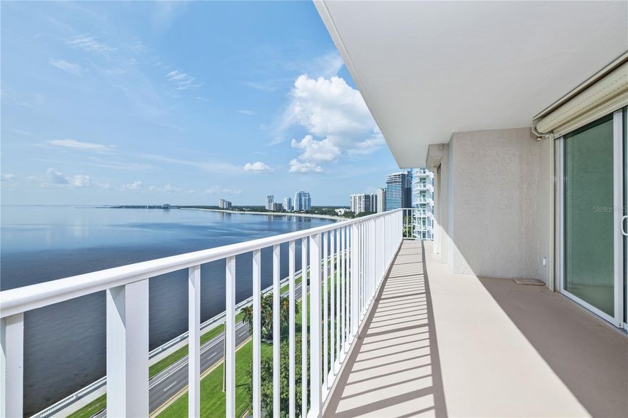 Wake up to breathtaking sunrise views from this 12th-floor residence at The Diplomat, one of Bayshore Boulevard’s most iconic waterfront addresses. From the moment you enter through the double doors, you’re met with an unforgettable sense of space and light framed by panoramic, unobstructed views of Tampa Bay. Enjoy the beautifully updated kitchen, complete with newer appliances, a walk-in pantry, and a thoughtfully designed built-in desk area, perfect for working from home or organizing your favorite recipes. The kitchen flows effortlessly into the open-concept dining and living area, where walls of sliding glass doors lead to an expansive balcony. Generously sized for outdoor dining or quiet mornings with coffee, the balcony offers the perfect front-row seat to vibrant sunrises and evening skies. The primary suite is a serene retreat with the same captivating water and Bayshore views, along with custom closet cabinetry to maximize space and style. The secondary bedroom also enjoys sweeping views and features a walk-in closet for ample storage. Additional interior highlights include recently painted walls, a dedicated laundry closet with washer and dryer, linen and entry closets, and abundant natural light throughout. Residents of The Diplomat enjoy a full suite of amenities including a newly updated tennis and pickleball court, sparkling pool, and a welcoming clubhouse for gatherings or relaxation. With direct access to Bayshore’s scenic walking and biking path, and just minutes from Tampa General Hospital, MacDill AFB, downtown Tampa, Hyde Park, top-rated schools, and Tampa International Airport—this is truly luxury living in the heart of South Tampa.