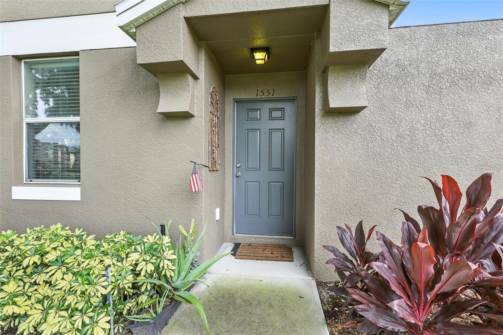 LOCATION, LOCATION, LOCATION! Welcome to Tucker Oaks Condominiums, a gated community just off the Florida Turnpike in Winter Garden. This spacious 3-bedroom, 2.5-bath townhome with a 2-car garage is ideally located near historic downtown Winter Garden.
Situated as an end unit, the home offers added privacy and is nestled among mature oak trees with a park right outside your front door. The layout features a functional open concept on the first floor and a screened-in back porch with pavers, perfect for relaxing.
The community includes sidewalks, a large pool with bathhouse, two parks, a dog park, basketball court, and picnic/BBQ areas—plenty of amenities to enjoy year-round.