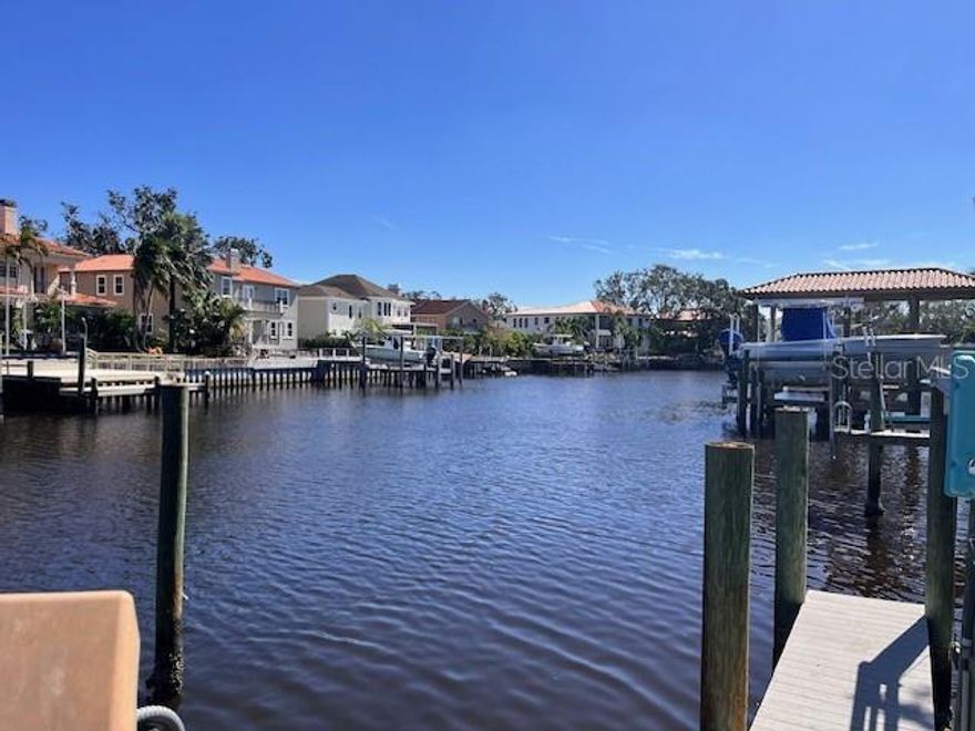 WATERFRONT CANAL LOT, APPROX 3 MINUTES FROM OPEN BAY, WITH NO BRIDGES. SEAWALL AND DOCK AND LIFTS. THE HOME FLOODED DURING HURRICANE HELENE SEPTEMBER 24, 2024. DRYWALL HAS BEEN REMOVED UP TO 4FT THROUGHOUT THE HOME. PROPERTY IS SELLING AS-IS FOR LAND.