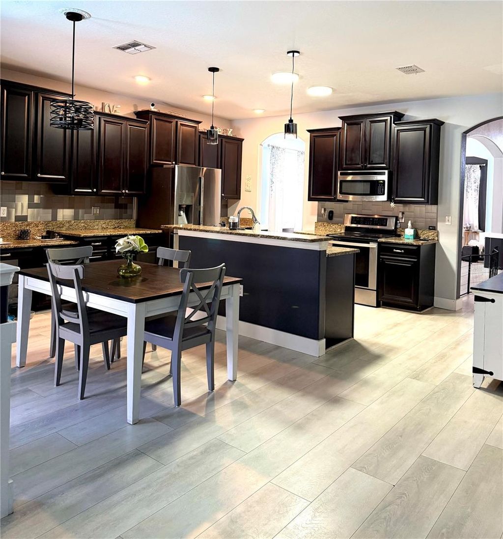 Photo of 11695 Crestridge Loop, New Port Richey, FL 34655 (MLS # W7883446)