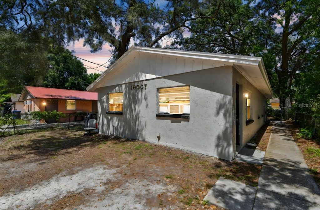 Photo of 10007 N 10th Street, Tampa, FL 33612 (MLS # TB8386870)