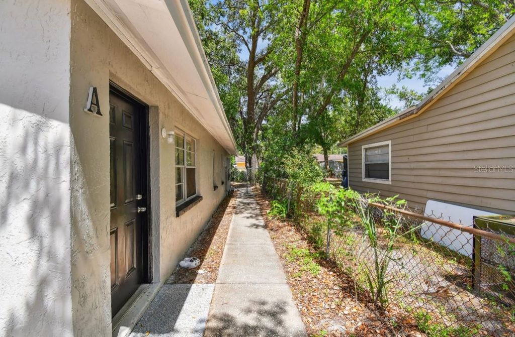 Photo of 10007 N 10th Street, Tampa, FL 33612 (MLS # TB8386870)