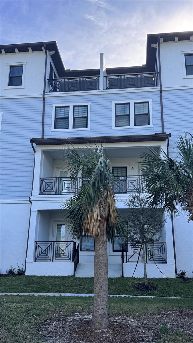 WATERFRONT VIEWS AND BEAUTIFUL SUNSETS can be enjoyed from the 4TH STORY PATIO of this BRAND NEW Townhome in the exclusive South Shore Yacht Club Community. You have to SEE THIS PLACE to BELIEVE IT! This four-story townhome features a private elevator for your convenience. As you enter the home from the covered patio, the first floor consists of a large room that could be used for an entertainment/game room, full bathroom and bedroom. The second floor has a large open kitchen, dining and family room with a balcony on the second floor. The third level hosts all three bedrooms, while the top level has a large roof deck for entertaining. Southshore Yacht Club is a masterplan community in desirable Ruskin, FL, that offers resort-style amenities and waterfront homesites. This gated Community features a FULL-SERVICE MARINA WITH DEEP-WATER ACCESS, a state-of-the-art clubhouse and breathtaking views of Tampa Bay. The private clubhouse offers billiards, lounge areas, and a pool overlooking one of the two marinas. Little Harbor is a boater's paradise with a sandy beach, two on-site restaurants, basketball, and pickleball courts, and a fitness center. Residents enjoy access to two community pools, a full-service marina with deep-water access, beachfront dining, water-inspired amenities, and some of the best sunset views of Tampa Bay. Bahia Beach is only a short walk from the townhomes. Also conveniently located to great shops, restaurants and major highways for easy access to Tampa.