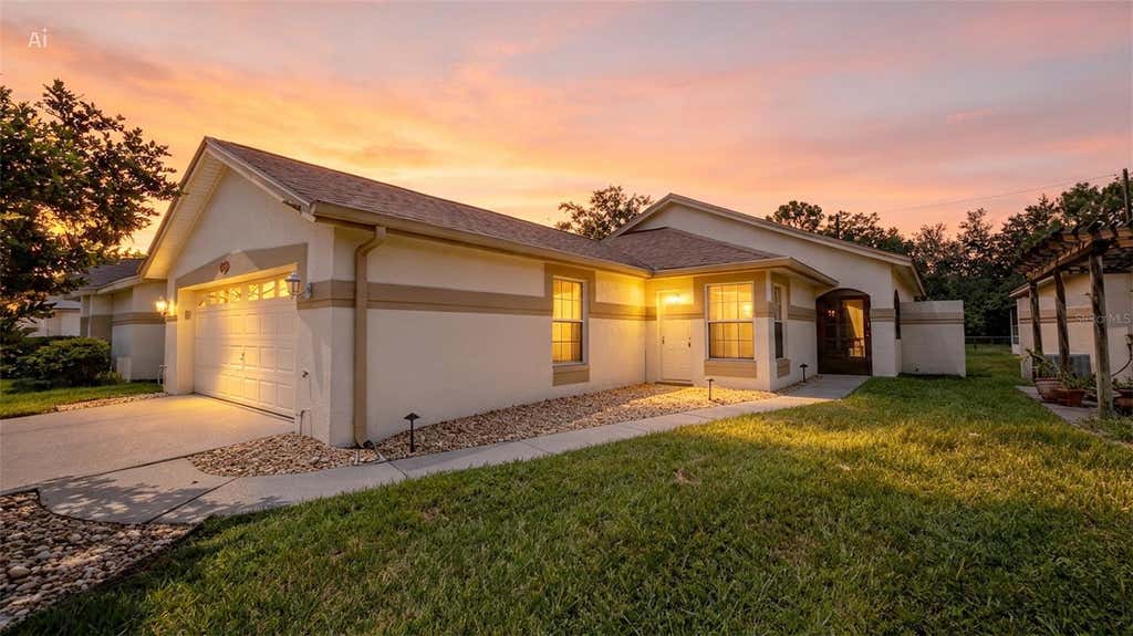 Photo of 11624 Peach Grove Lane, Orlando, FL 32821 (MLS # O6432704)