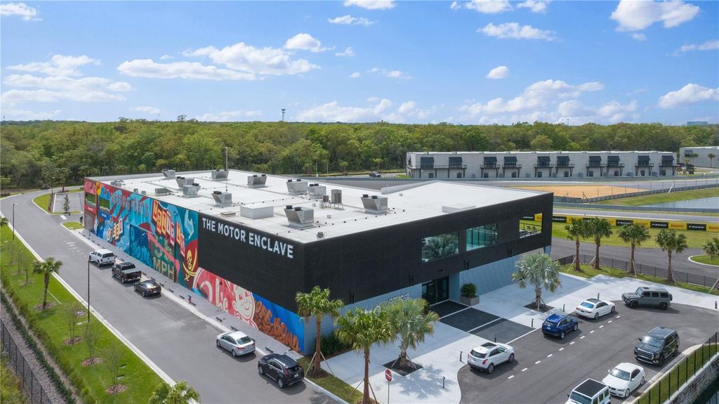 Photo of 6500 Motor Enclave Way #506, Tampa, FL 33610 (MLS # S5100311)