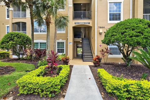 Photo of 7664 Comrow St #103, Kissimmee, FL 34747 (MLS # O6333742) Photo of 7664 Comrow St #103, Kissimmee, FL 34747 (MLS # O6333742)