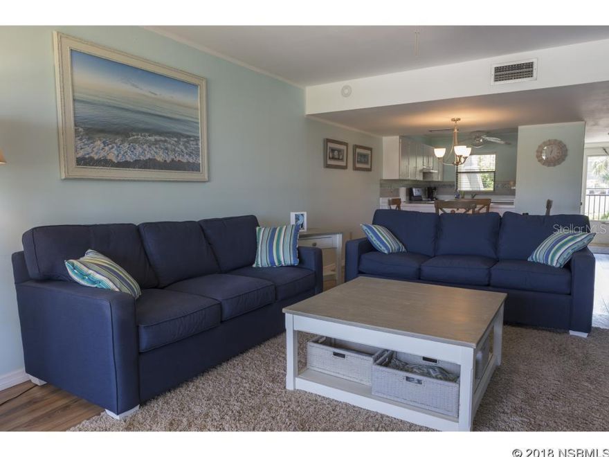 Rarely does a condo this nice and in a great riverfront beachside development come on the market in this price range! Prepare to fall in love with the location, the grounds and the unit. The home has been updated over nearly every square foot, including new flooring (engine wood lam, tile and carpet), new SS appliances, tile backsplash, painting throughout, windows, bathroom vanities, showers, fixtures and more. This unit is much wider than others, allowing for a spacious kitchen, dining and family room.  The master suite is extremely large with an ensuite double vanity bath. Enjoy the convenience of an inside laundry. Beautiful views of the intra-coastal waterway and sunsets can be enjoyed from your private screened balcony.  Amenities include a well-kept community pool, clubhouse with kitchen and BBQ area, dock with fishing pier (being rebuilt) and cleaning station. Private marina with 16 slips, rentals when available. Short walk to the beach, inlet and dog park. Shopping, dining and entertainment on Historical Flagler Ave and Canal St are within biking distance. You just canât find a better value for a Beachside Lifestyle. MEASUREMENTS ARE APPROXIMATE.  ALL INFORMATION IS ASSUMED ACCURATE BUT NOT GUARANTEED. ;LocationDescription: Condo ;Water: City