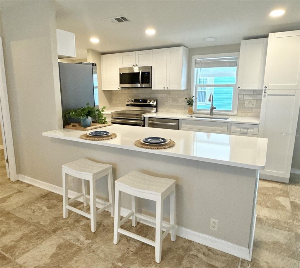 Photo of 7107 Mount Essex Drive NE #520, St Petersburg, FL 33702 (MLS # TB8454306)