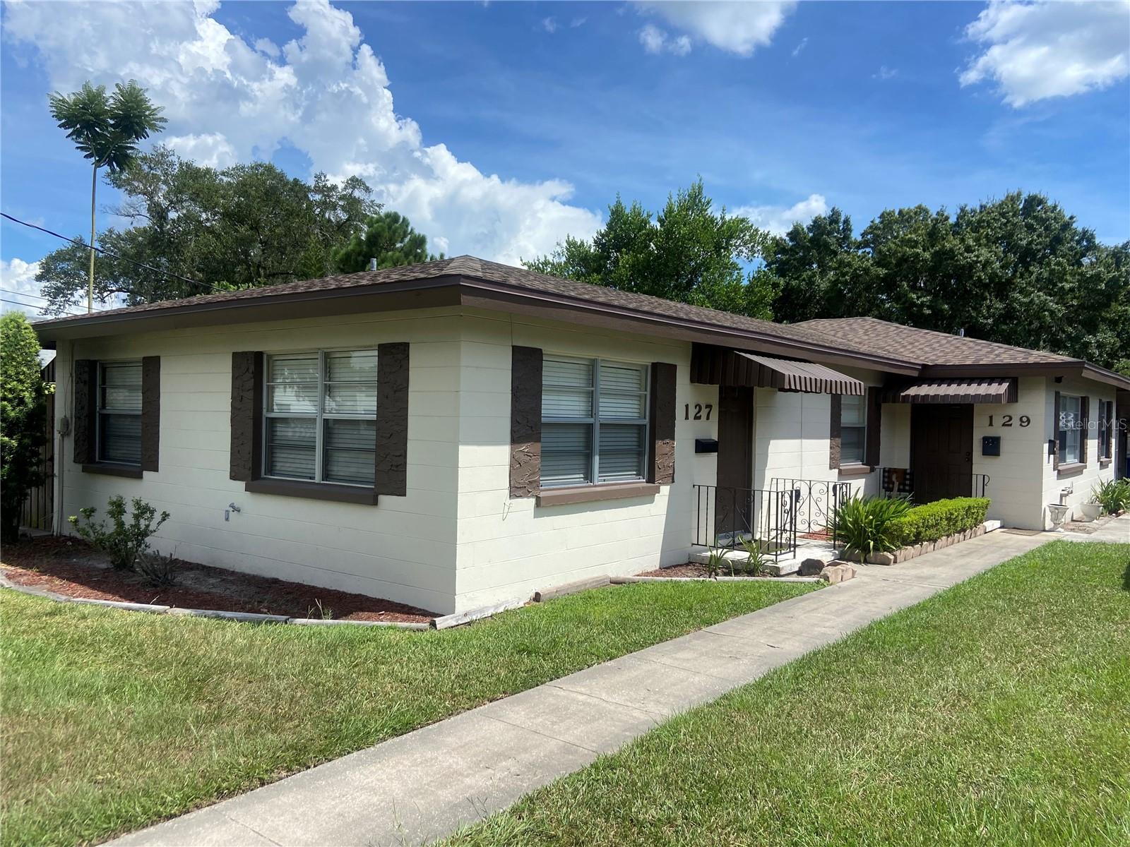Under contract-accepting backup offers. PRICE IMPROVEMENT! This investor's dream in the Lake Hollingsworth area is currently fully leased, providing the new owner with instant income! Two of the units consist of 2 bedrooms/1 bathroom and the third unit has 1 bedroom/1 bathroom. This exceptionally well maintained triplex has undergone many new upgrades. Newer roof, newer AC in one of the units, new hot water heater, electrical and plumbing upgrades, new privacy fence providing the tenants with their own private outdoor space, and fresh paint throughout. Don't miss out on this amazing investment opportunity in the heart of Lakeland. Call today for your showing!